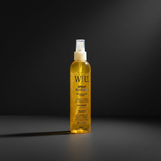 Sarise Cosmética Flexible Strand Brush leave-in keratin detangling spray bottle on a dark background.